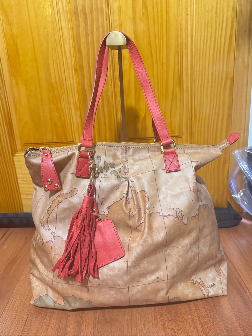 Alviero Martini Beige Map-Print Tote with Coral Pink Handles and Tassel